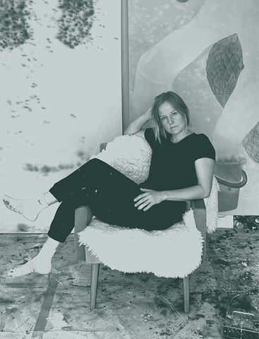 Abstract art print with blue and black patterns on a white background