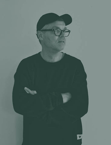 White book with a black grid pattern on a white background