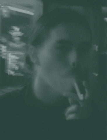 Brown textured fabric on a light wooden surface