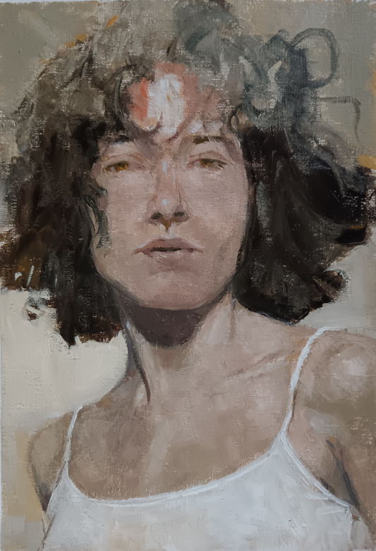 Artistic portrait of a person with a white tank top against a neutral background