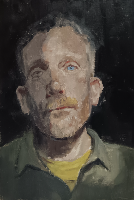 Artistic portrait of a person with a dark background