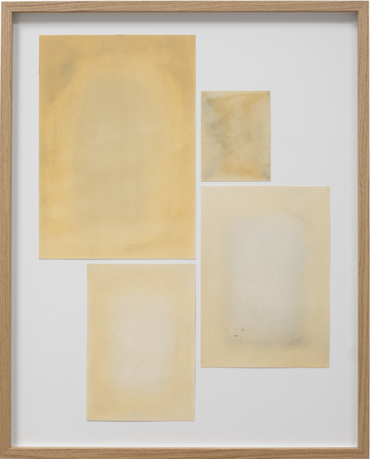 Framed abstract art with beige and brown tones on a white background