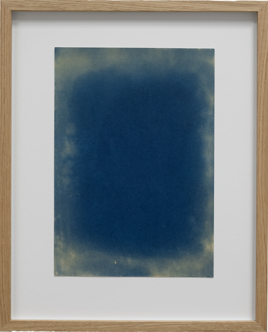 Framed abstract artwork with a blue and green color scheme on a white background