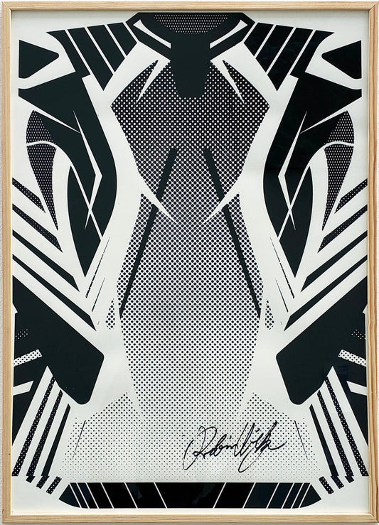 A framed art print featuring a black and white geometric design of a tuxedo on a mannequin, mounted on a textured white wall.