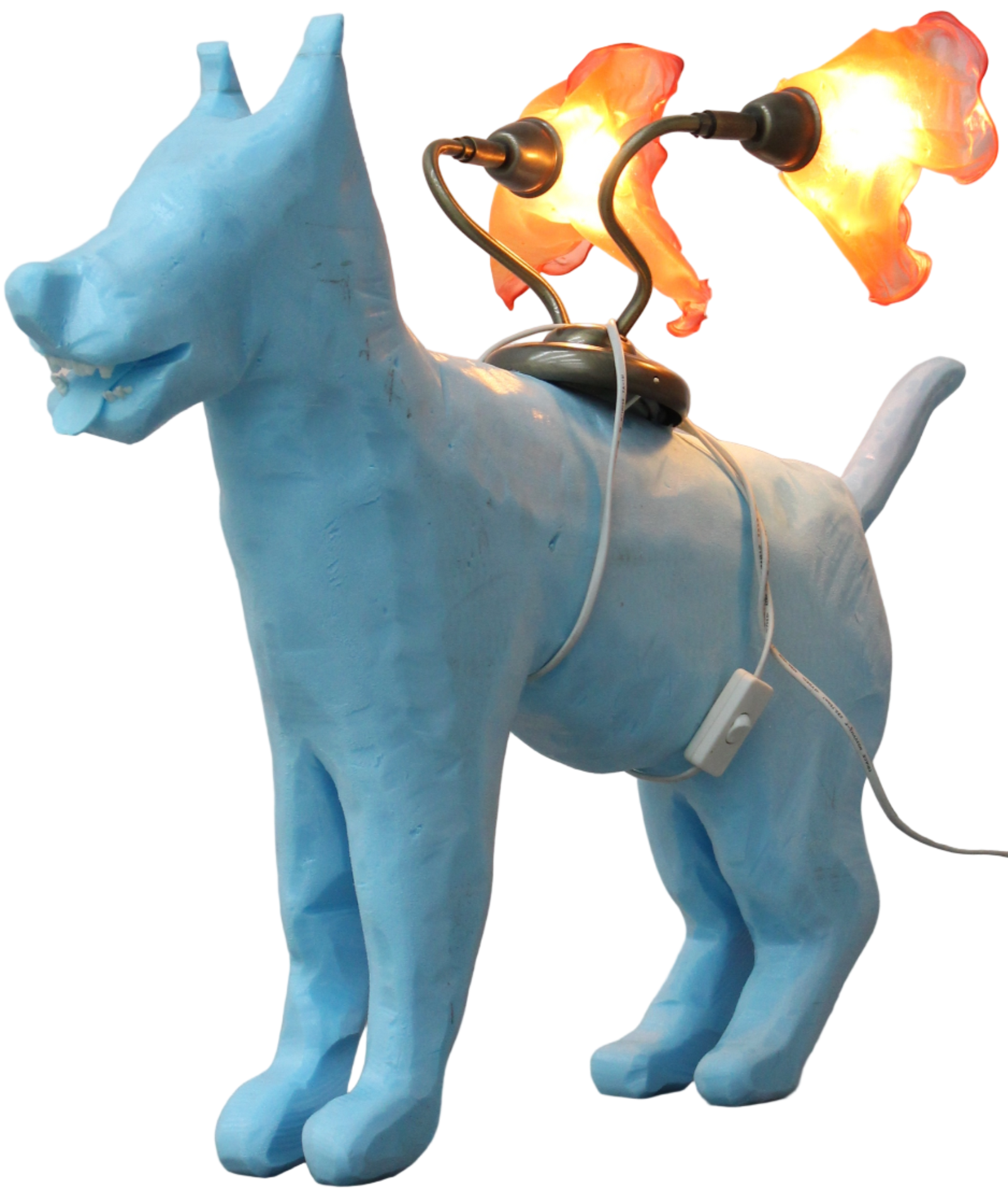 Blue dog-shaped lamp with a light bulb on a gray surface.